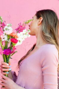 A woman holding flowers